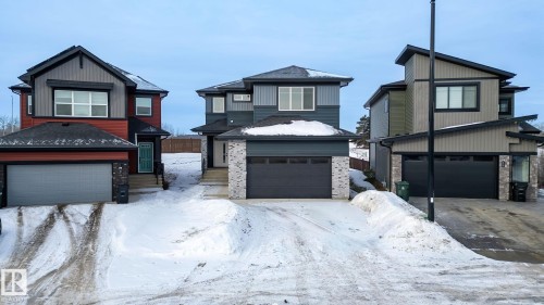 View of front of home with a garage - 9 Elwyck Gate, Spruce Grove, AB - Outdoor With Facade