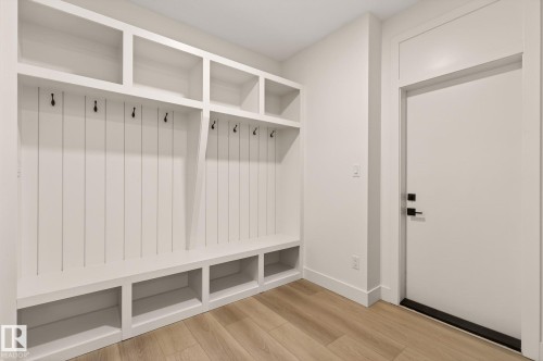 Mudroom featuring light wood-type flooring and baseboards - 9 Elwyck Gate, Spruce Grove, AB - Indoor