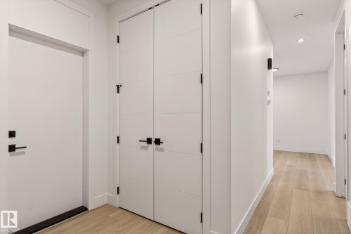 Hall featuring light wood-style floors and recessed lighting - 9 Elwyck Gate, Spruce Grove, AB - Indoor Photo Showing Other Room