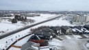 Snowy aerial view featuring a residential view - 9 Elwyck Gate, Spruce Grove, AB  - Outdoor With View 