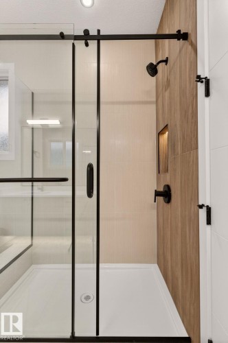 Bathroom featuring a stall shower and a textured ceiling - 9 Elwyck Gate, Spruce Grove, AB - Indoor Photo Showing Bathroom