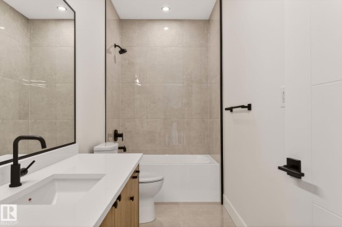Full bathroom with vanity,  shower combination, light tile patterned floors, and recessed lighting - 9 Elwyck Gate, Spruce Grove, AB - Indoor Photo Showing Bathroom