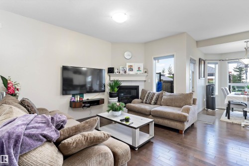 6934 19A Avenue Sw, Edmonton, AB - Indoor Photo Showing Living Room With Fireplace