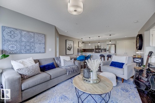 210 5029 Edgemont Boulevard, Edmonton, AB - Indoor Photo Showing Living Room