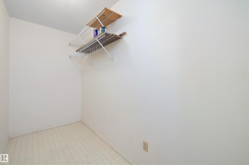 Spacious walk-in closets in Primary bedroom - 218 18012 95 Avenue, Edmonton, AB - Indoor With Storage