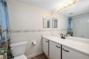 Bathroom featuring shower, vanity, toilet, and tub - 218 18012 95 Avenue, Edmonton, AB  - Indoor Photo Showing Bathroom 