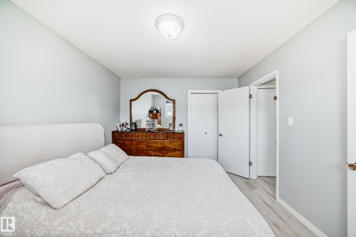 Bedroom featuring light wood-style floors and a closet - 12203 147 Avenue, Edmonton, AB - Indoor Photo Showing Bedroom