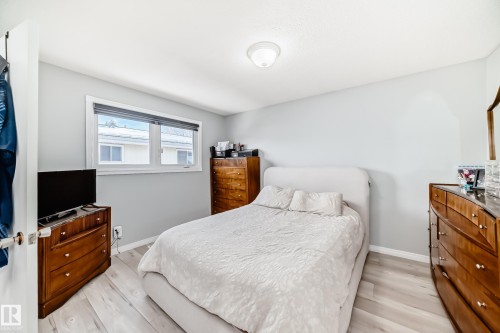 Bedroom with light wood-style floors and baseboards - 12203 147 Avenue, Edmonton, AB - Indoor Photo Showing Bedroom