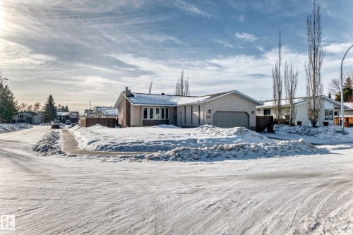 Ranch-style home with an attached garage and a chimney - 12203 147 Avenue, Edmonton, AB - Outdoor