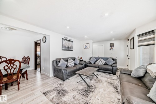 Living room with light wood-type flooring and recessed lighting - 12203 147 Avenue, Edmonton, AB - Indoor Photo Showing Living Room
