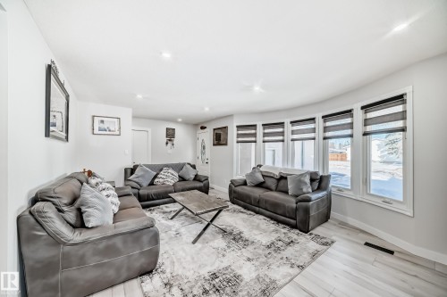 Living area featuring light wood-style floors and recessed lighting - 12203 147 Avenue, Edmonton, AB - Indoor Photo Showing Living Room