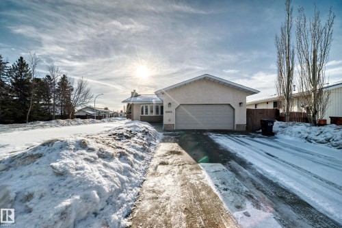 Single story home featuring an attached garage and stucco siding - 12203 147 Avenue, Edmonton, AB - Outdoor