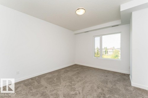 306 1316 Windermere Way, Edmonton, AB - Indoor Photo Showing Other Room