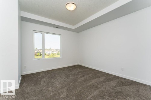 306 1316 Windermere Way, Edmonton, AB - Indoor Photo Showing Other Room