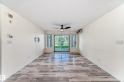 Unfurnished room with light wood-style floors and a ceiling fan - 