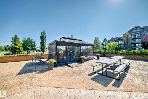 View of patio featuring a gazebo and outdoor dining area - 125 278 Suder Greens Drive, Edmonton, AB - Outdoor With Deck Patio Veranda