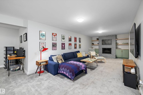 6304 94A Avenue, Edmonton, AB - Indoor Photo Showing Living Room With Fireplace