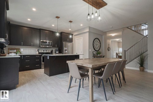 Dining area featuring light wood-type flooring and recessed lighting - 2011 201 Street, Edmonton, AB - Indoor
