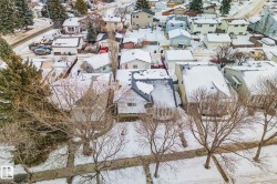 Snowy aerial view featuring a residential view - 