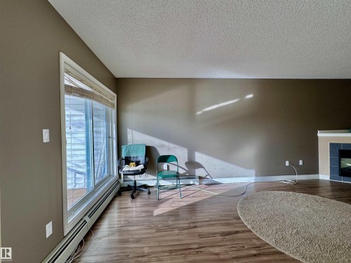 208 11446 40 Avenue, Edmonton, AB - Indoor With Fireplace