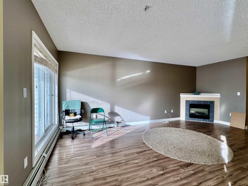 208 11446 40 Avenue, Edmonton, AB - Indoor With Fireplace