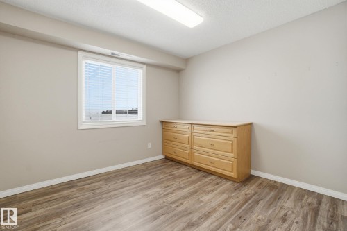 320 7801 Golf Course Road, Stony Plain, AB - Indoor Photo Showing Other Room