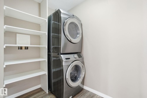 320 7801 Golf Course Road, Stony Plain, AB - Indoor Photo Showing Laundry Room