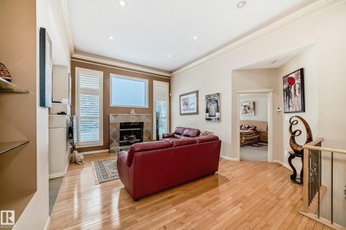 241 Darlington Crescent, Edmonton, AB - Indoor Photo Showing Living Room With Fireplace