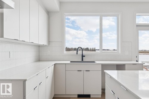 7015 50A Avenue, Beaumont, AB - Indoor Photo Showing Kitchen