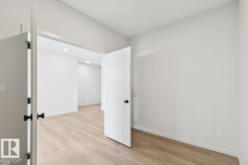 7015 50A Avenue, Beaumont, AB - Indoor Photo Showing Other Room