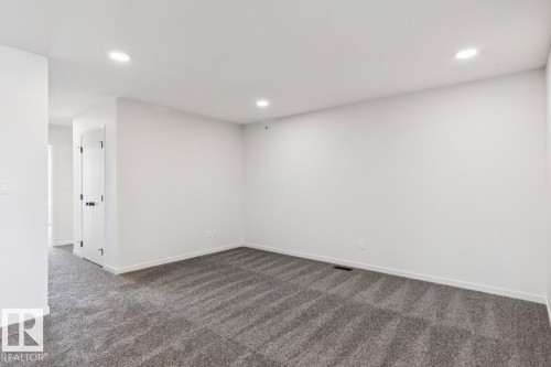 7015 50A Avenue, Beaumont, AB - Indoor Photo Showing Other Room