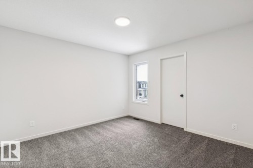 7015 50A Avenue, Beaumont, AB - Indoor Photo Showing Other Room