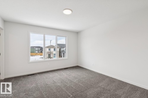 7015 50A Avenue, Beaumont, AB - Indoor Photo Showing Other Room