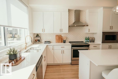 7015 50A Avenue, Beaumont, AB - Indoor Photo Showing Kitchen With Upgraded Kitchen
