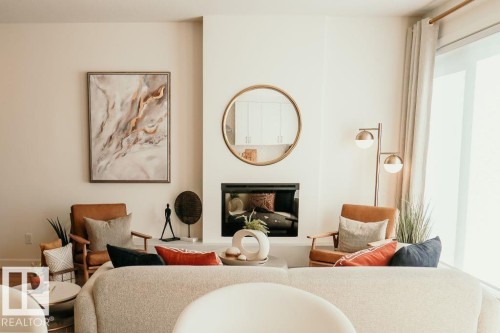 7015 50A Avenue, Beaumont, AB - Indoor Photo Showing Bedroom With Fireplace