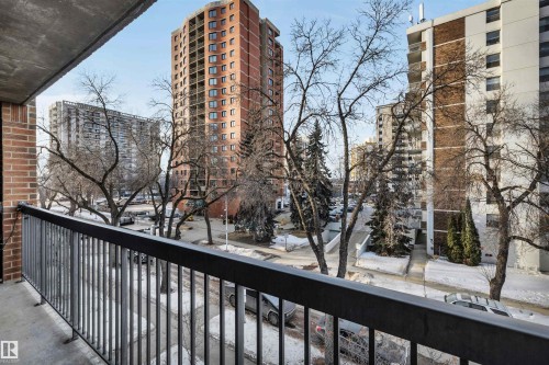 View of snow covered back of property - 402 9929 113 Street, Edmonton, AB - Outdoor With Balcony