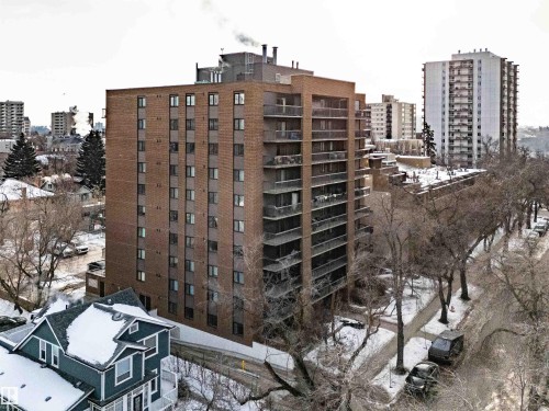 Snow covered property with a city view and a view of apartment building / complex - 402 9929 113 Street, Edmonton, AB - Outdoor With Balcony With Facade