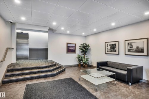 Community lobby featuring recessed lighting and a drop ceiling - 402 9929 113 Street, Edmonton, AB - Indoor