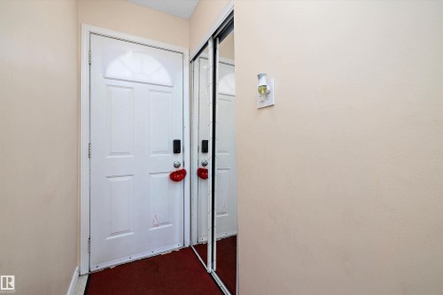 Doorway to outside featuring baseboards - 127 Cornell Court, Edmonton, AB - Indoor Photo Showing Other Room