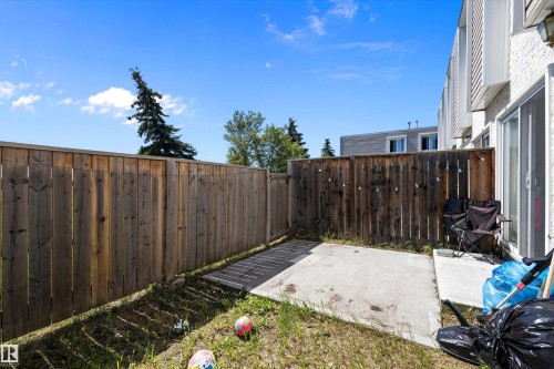 Fenced backyard featuring a patio area - 127 Cornell Court, Edmonton, AB - Outdoor With Exterior