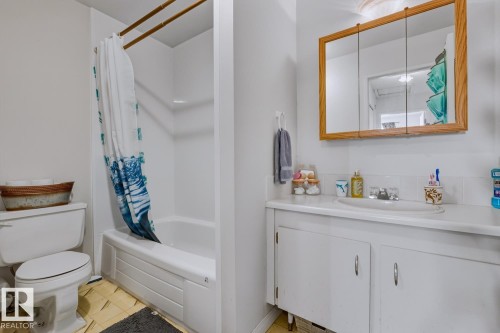 Full bathroom with shower / tub combo and vanity - 18307 66 Avenue, Edmonton, AB - Indoor Photo Showing Bathroom