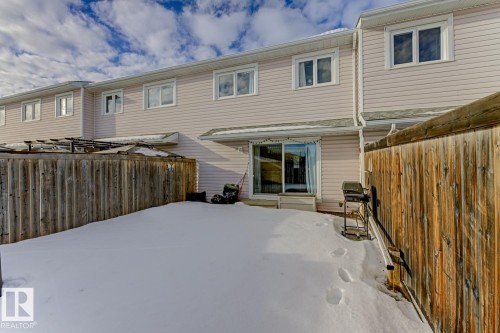 Back of property with a fenced backyard - 18307 66 Avenue, Edmonton, AB - Outdoor With Exterior