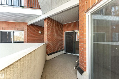 Entrance to property with brick siding - 112 260 Sturgeon Road, St. Albert, AB - Outdoor With Exterior