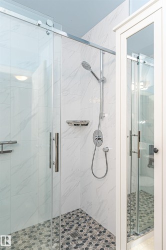 Bathroom with a marble finish shower - 112 260 Sturgeon Road, St. Albert, AB - Indoor Photo Showing Bathroom