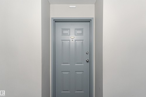 Property entrance with stucco siding - 112 260 Sturgeon Road, St. Albert, AB - Indoor Photo Showing Other Room