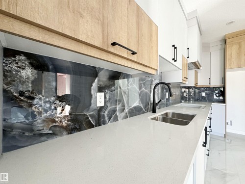 1312 35 Street, Edmonton, AB - Indoor Photo Showing Kitchen With Double Sink
