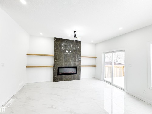 1312 35 Street, Edmonton, AB - Indoor With Fireplace