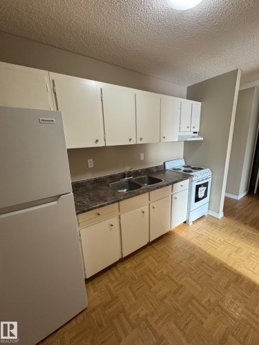 315 7220 144 Avenue, Edmonton, AB - Indoor Photo Showing Kitchen With Double Sink
