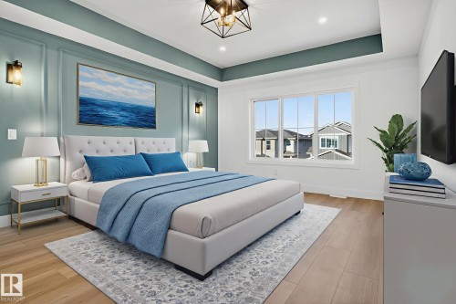Bedroom featuring light wood-type flooring, a decorative wall, and suspended lighting - 3508 6 Street, Edmonton, AB - Indoor Photo Showing Bedroom
