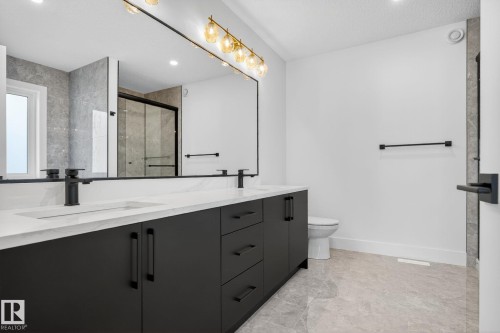 Full bathroom featuring a stall shower, double vanity, and recessed lighting - 3508 6 Street, Edmonton, AB - Indoor Photo Showing Bathroom